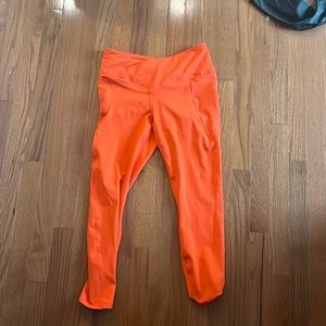 small fabletic neon orange leggings